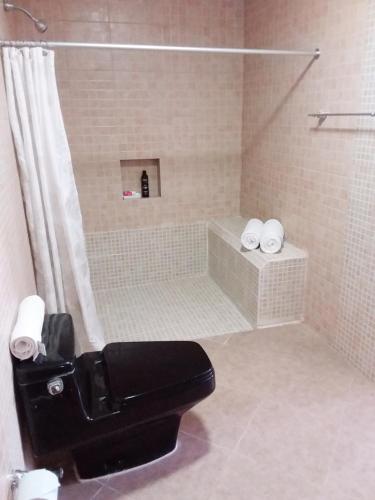 Ένα μπάνιο στο Junior suite Privada 7 min del Aeropuerto