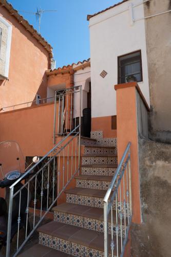 a staircase leading up to a building with a window at Giulietta Normanna in Sciacca