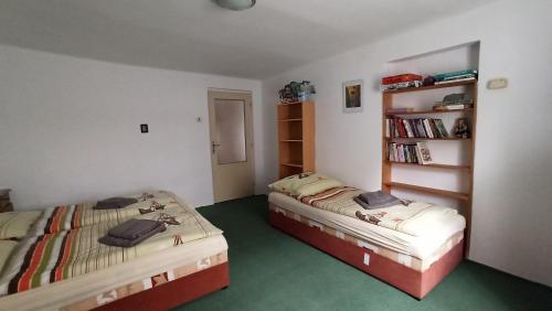 Voodi või voodid majutusasutuse Rodinná chalupa toas