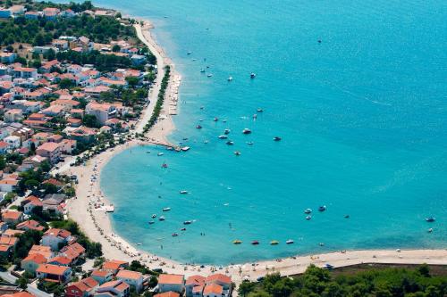 an aerial view of a beach with people in the water at Premium Residence Virotel in Vir