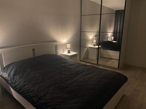 Llit o llits en una habitació de DAK apartament