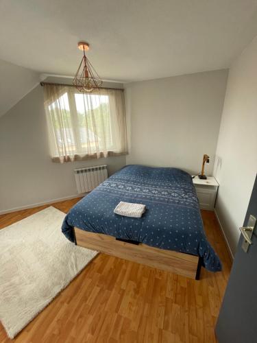 Кровать или кровати в номере Appartement Dôme