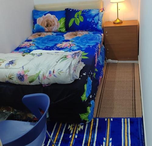 Postel nebo postele na pokoji v ubytování ComfyDees Apartments