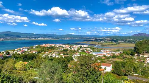 a small town on the shore of a lake at Trajadinha - Miracaminha in Caminha