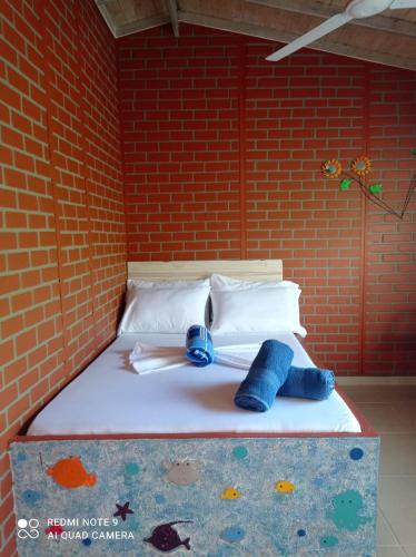 Katil atau katil-katil dalam bilik di Hostal Bralgijon Capurganá