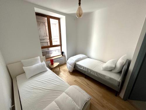 Postel nebo postele na pokoji v ubytování Appartement le saint Pierre