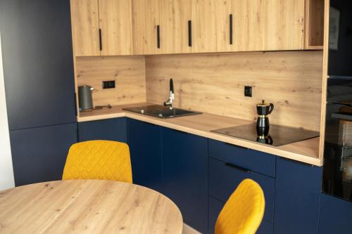 Kuchyň nebo kuchyňský kout v ubytování Apartamenty Lesko 23