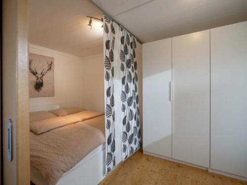 Ένα ή περισσότερα κρεβάτια σε δωμάτιο στο Apart Anfang