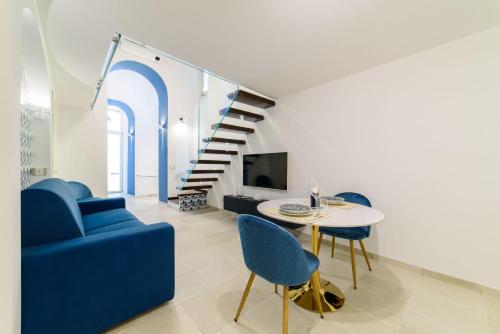 Ein Sitzbereich in der Unterkunft Dimora Bertella boutique & SpA