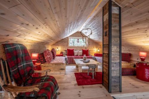Posezení v ubytování Chalet Mikua, 6 p. spa, billard, Forêt & Nature