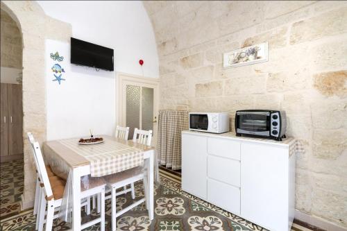 Dapur atau dapur kecil di Chiarina rooms 2