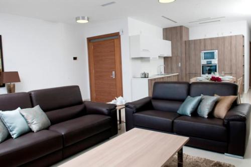 Η κουζίνα ή μικρή κουζίνα στο Quisisana Apartments - Cast Renting