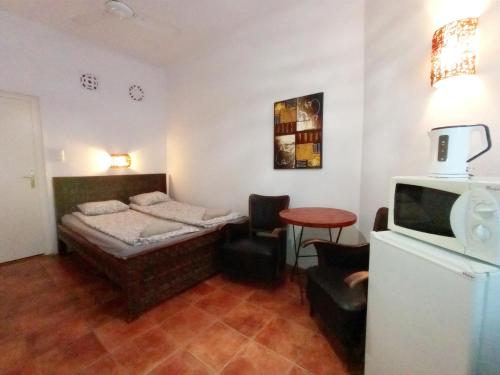 Posteľ alebo postele v izbe v ubytovaní Bp SOHO GRAND Apartment