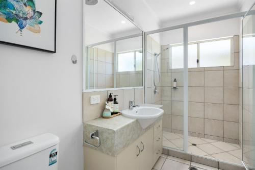 a bathroom with a sink and a shower at 8 235 Gympie Tce Noosaville in Noosaville