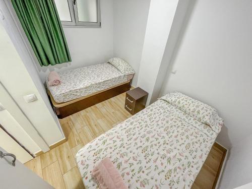 Posteľ alebo postele v izbe v ubytovaní 403 APARTAMENTO VISTA MAR con BALCÓN