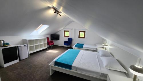 En eller flere senge i et værelse på Turquoise Konak