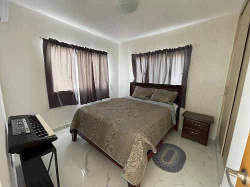 Postel nebo postele na pokoji v ubytování Villa Campestre Bavaro-Punta Cana