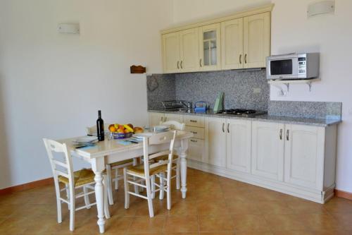 Dapur atau dapur kecil di GF Apartments Li Seddi
