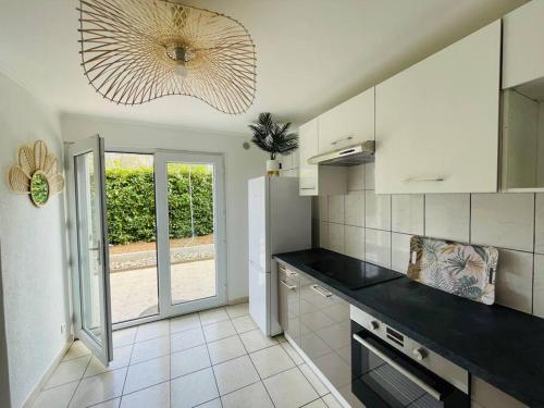 Dapur atau dapur kecil di Maison Time Break Jacuzzi - 4 étoiles