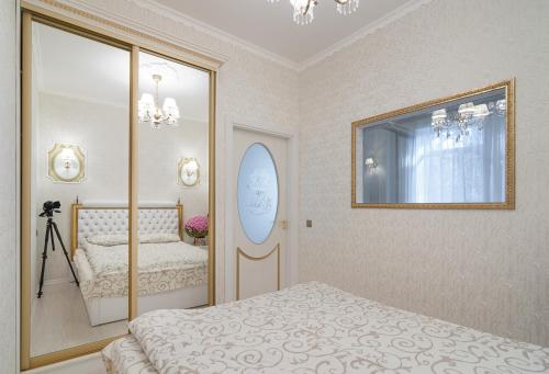 Кровать или кровати в номере Apartment BonApart