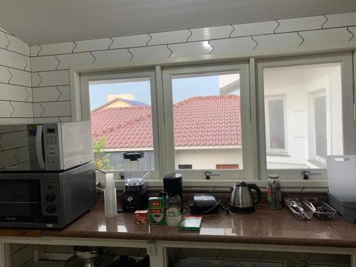 Cuisine ou kitchenette dans l'établissement Apartamento próximo ao Aeroporto de Florianópolis