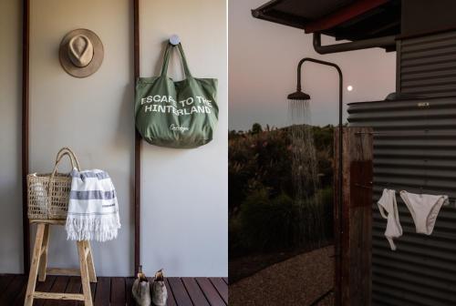 a green bag hanging on a wall next to a door at Carinya Byron Bay in Hayters Hill
