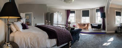 Ένα ή περισσότερα κρεβάτια σε δωμάτιο στο Dower House Hotel
