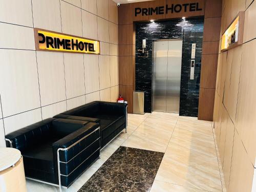 a hallway with a entrance to a entrance to aperate hotel at Prime Hotel at TRX Tower in Kuala Lumpur