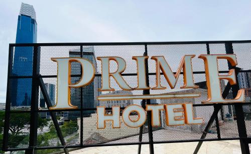 a sign for aryan hotel on a fence at Prime Hotel at TRX Tower in Kuala Lumpur
