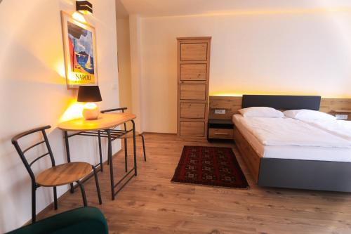 Ένα ή περισσότερα κρεβάτια σε δωμάτιο στο Apartments Katrca Bežigrad