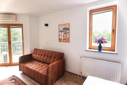 Χώρος καθιστικού στο Apartments Katrca Bežigrad
