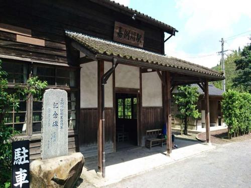 a building with a sign in front of it at Nichinankaigan Nango Prince Hotel in Nichinan