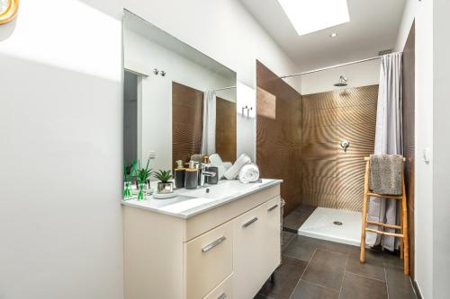 a bathroom with a sink and a mirror at Can Olivera in Nuestra Señora de Jesus