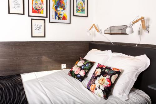 Postel nebo postele na pokoji v ubytování L'Aparté