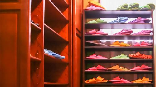 a closet filled with lots of different colored shoes at Kyoto - Hotel / Vacation STAY 36511 in Kyoto