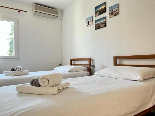 Posteľ alebo postele v izbe v ubytovaní Lemon Tree Apartments