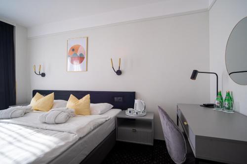Кровать или кровати в номере Marena Wellness & Spa