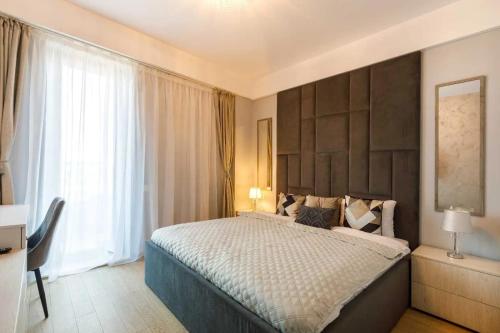 En eller flere senge i et værelse på APARTAMENT YNA