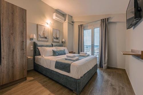 Postel nebo postele na pokoji v ubytování CHE BELLO LUXURY APARTMENTS