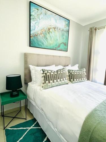 Ένα ή περισσότερα κρεβάτια σε δωμάτιο στο Trendy, Comfortable 1 bedroom Apartments in Mthatha