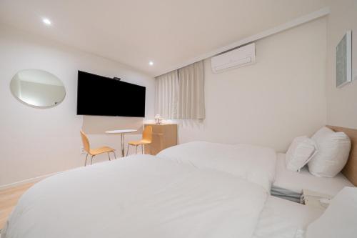 TV a/nebo společenská místnost v ubytování Aank Hotel Cheongju Uam 2nd