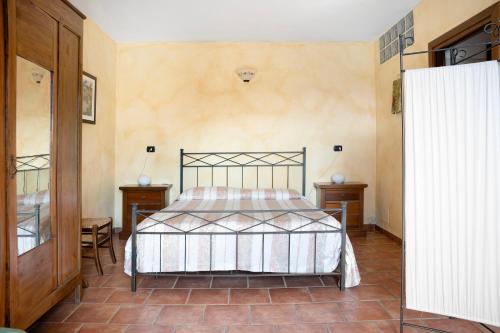 En eller flere senge i et værelse på Appartamento in Vigna Gallina