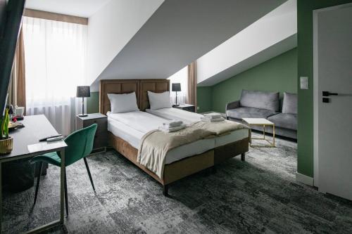 Postel nebo postele na pokoji v ubytování 4Wings Apartments