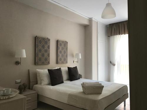 Ένα ή περισσότερα κρεβάτια σε δωμάτιο στο Residenza Flegrea