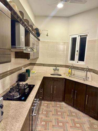 Cuina o zona de cuina de Executive Apartment