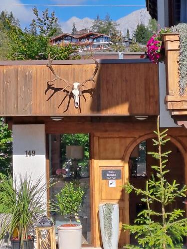 a spider on the side of a building at Zwei Hirsche in Seefeld in Tirol