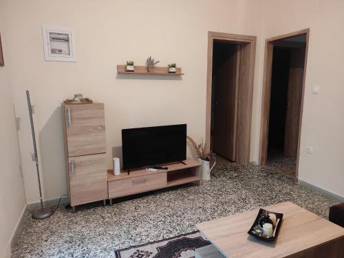 Μια τηλεόραση ή/και κέντρο ψυχαγωγίας στο NP Apartment