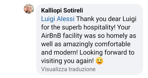 a screenshot of a text message of a person with aigiligil script lickiest at Alessi Suites & Studio in Mazzarino