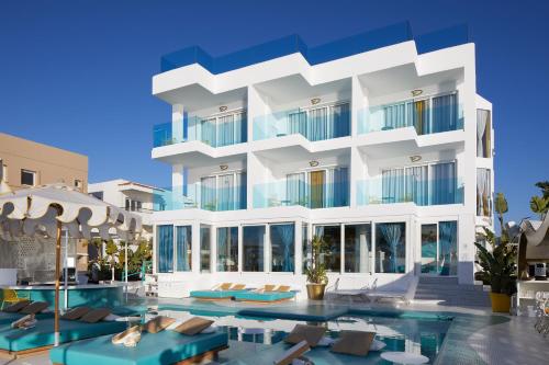 una representación de un hotel con piscina en Dorado Ibiza - Adults Only en Playa d'en Bossa