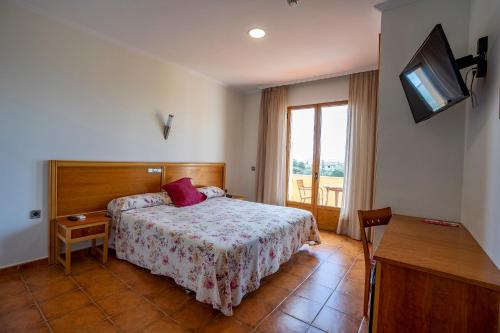 Postel nebo postele na pokoji v ubytování Hotel Los Barruecos by Croma